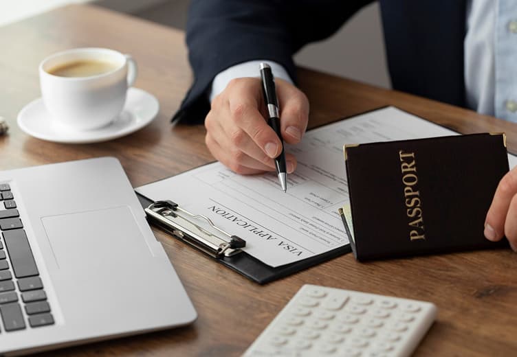 Traveller preparing documents for a visa application