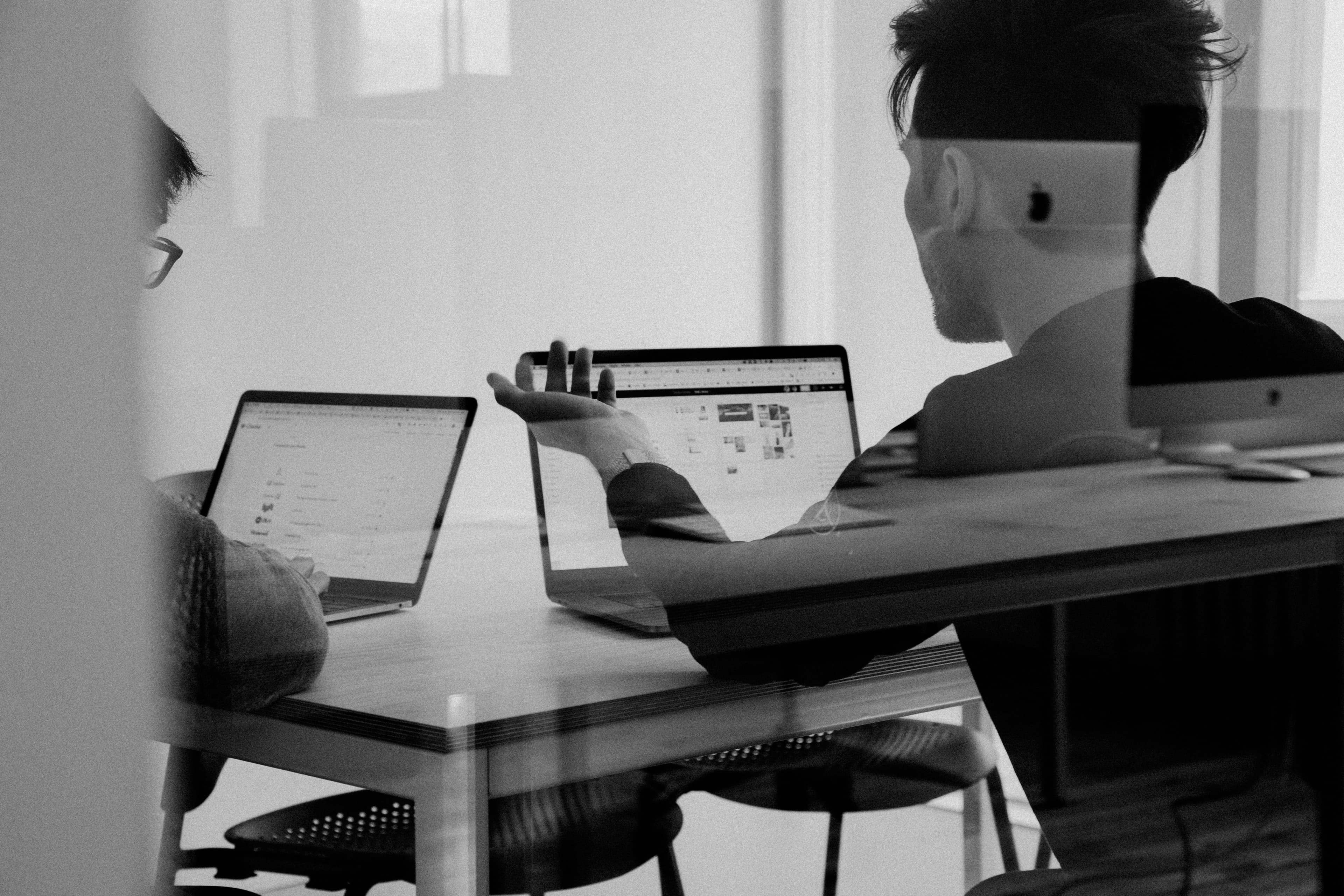 Visa specialists preparing a visitor visa application file